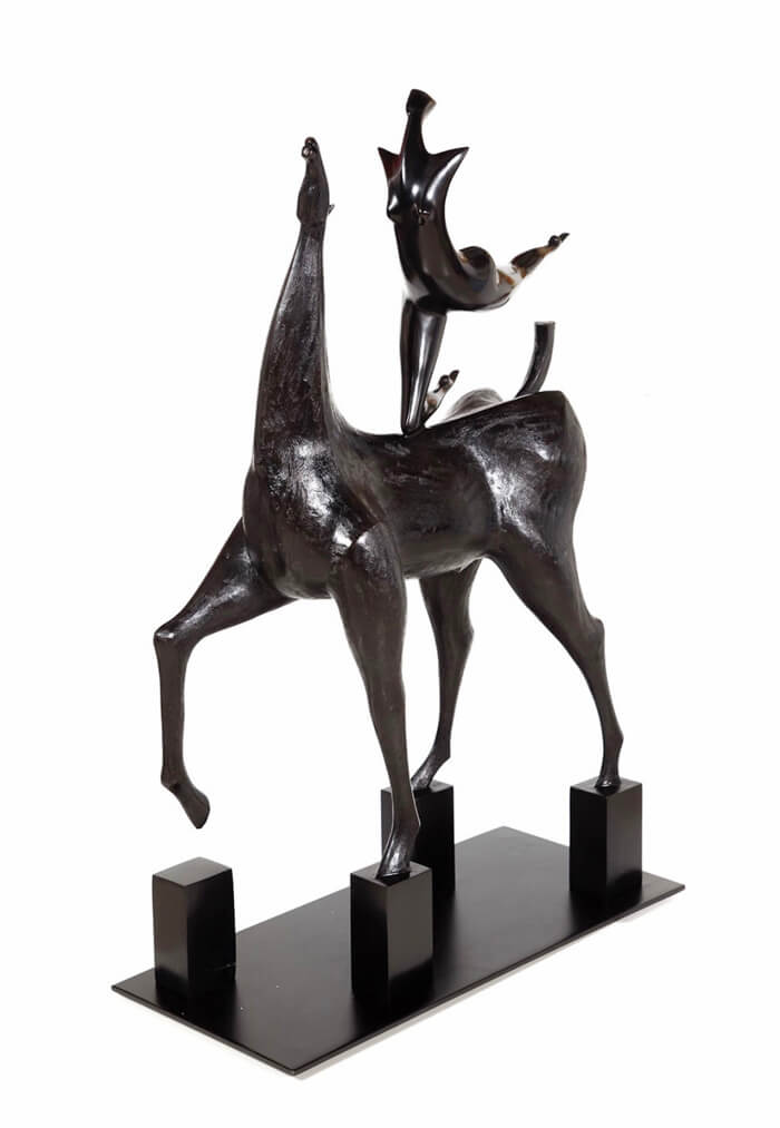 Lady Riding Sculpture